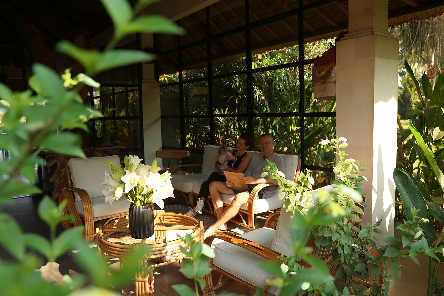 The reception lounge, with lilies on the table